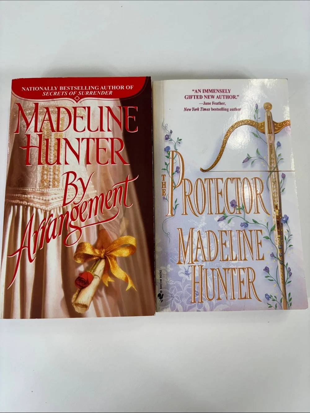 2 romance paperback books by Madeline Hunter